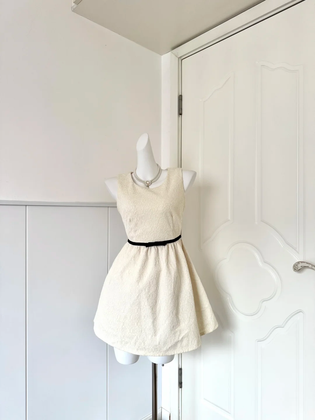 Women Cream Homecoming Dress, Sleeveless Round Neck Textured Jacquard Fabric, Thin Black Bow Sash, High Waist Voluminous A‑Line Mini Cocktail Party Dress gh9240