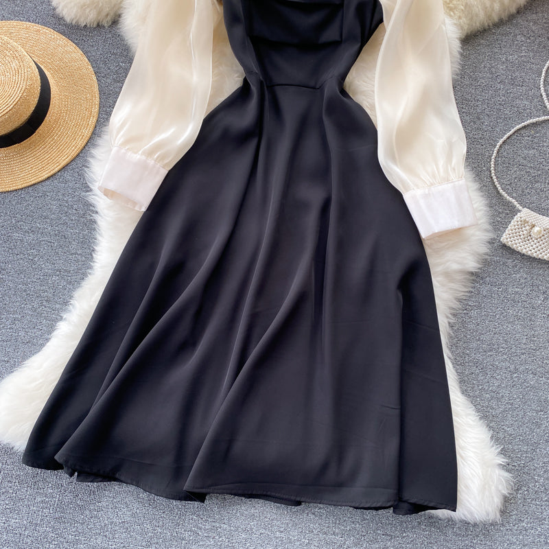 Schwarzes langärmliges Kleid in A-Linie Modekleid 10673