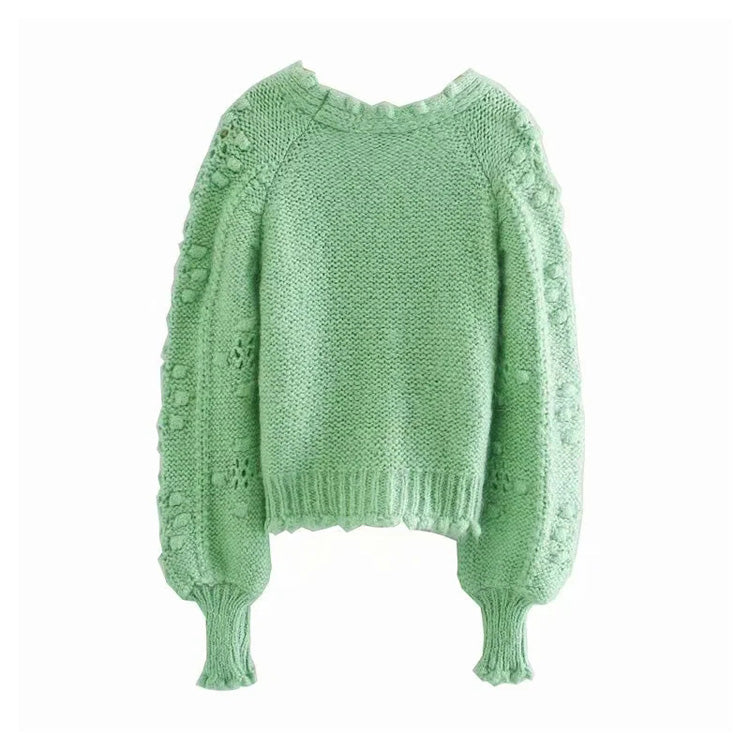 Nouveau cardigan tricoté à boutons artificiels creux sphériques 7253