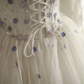 Off‑the‑Shoulder Ball Gown Wedding Dress, Puff Short Sleeve Corset Bodice 3D Purple Floral Applique Ruffled Satin‑Trim Tulle Skirt Bridal Gown gh9117