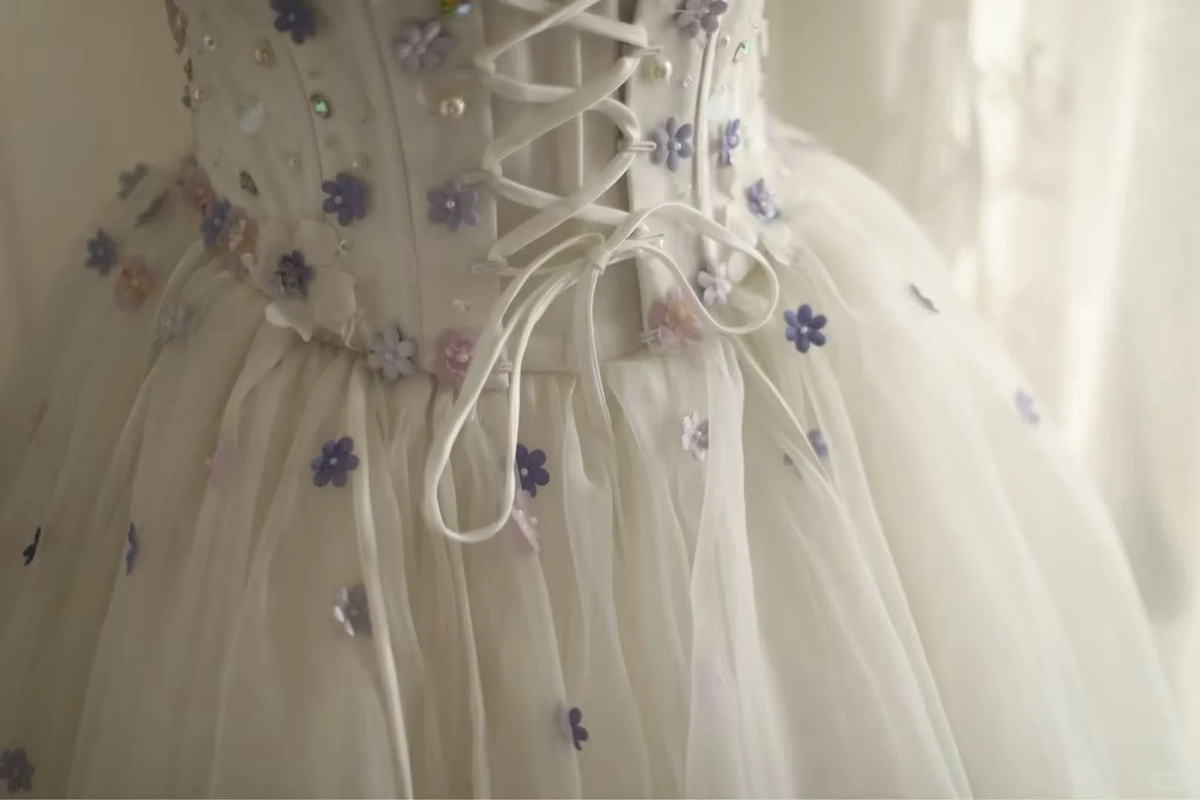 Off‑the‑Shoulder Ball Gown Wedding Dress, Puff Short Sleeve Corset Bodice 3D Purple Floral Applique Ruffled Satin‑Trim Tulle Skirt Bridal Gown gh9117