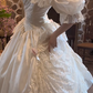 Cream White Vintage Palace Wedding Gown, V‑Neck Puff Mid‑Sleeve Lace Trim 3D Fabric Rose Satin Ball Gown Bridal Dress gh9069
