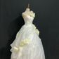 Off-White One-Shoulder Romantic Wedding Dress with Floral Details, Cinched Waist, Voluminous Princess Skirt gh8315