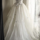 Off‑the‑Shoulder Ball Gown Wedding Dress, Puff Short Sleeve Corset Bodice 3D Purple Floral Applique Ruffled Satin‑Trim Tulle Skirt Bridal Gown gh9117