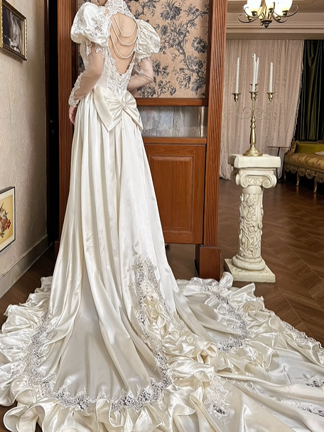 Champagne Vintage Satin Wedding Gown, Illusion Lace High Neck Over Sweetheart Neck, Puff Shoulder Lace Long Sleeves, Gold‑Thread Lace Appliqué Pointed Waist, A‑Line Satin Long Train With Ruffle Lace Hem, Prom Dress gh8651