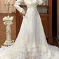 Ivory Vintage Tulle Wedding Prom Dress, Lace High Neck Illusion V‑Neck, Leg‑of‑Mutton Puff Sleeves, Lace Appliqués, Multi‑Tier Ruffle Cake Skirt gh8677