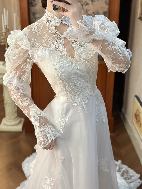 Ivory Vintage Lace Wedding Gown, Cut‑out High Neck With Keyhole V‑Detail, Puff Lace Long Sleeves With Tiered Ruffle Cuffs, Floral Lace Appliqué Waistband, A‑Line Multi‑Tier Ruffle Lace Long Train, Prom Dress gh8650