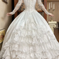White Vintage Satin Wedding Ball Gown, V‑Neck Sheer Lace Long Sleeves, Lace Beaded Appliqué Fitted Bodice, Multi‑Layer Ruffle Cake Skirt, Prom Dress gh8658
