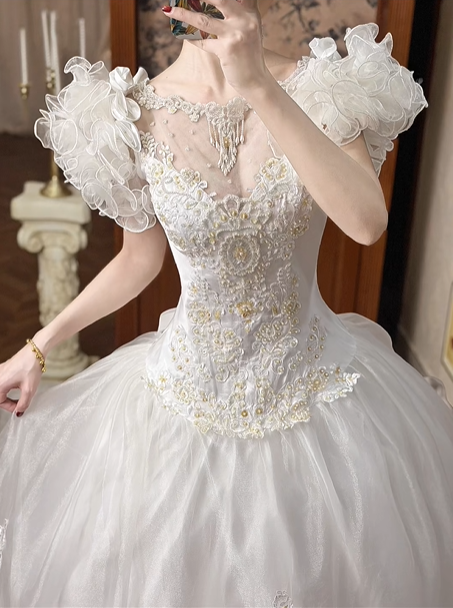 White Vintage Tulle Wedding Ball Gown, Tassel Fringe Illusion Round Neck Over Sweetheart Neck, 3D Floral Ruffle Puff Short Sleeves, Heavy Beaded Lace Appliqué Bodice, Voluminous A‑Line Tulle Skirt With Multi‑Layer Ruffle Hem, Prom Dress gh8655