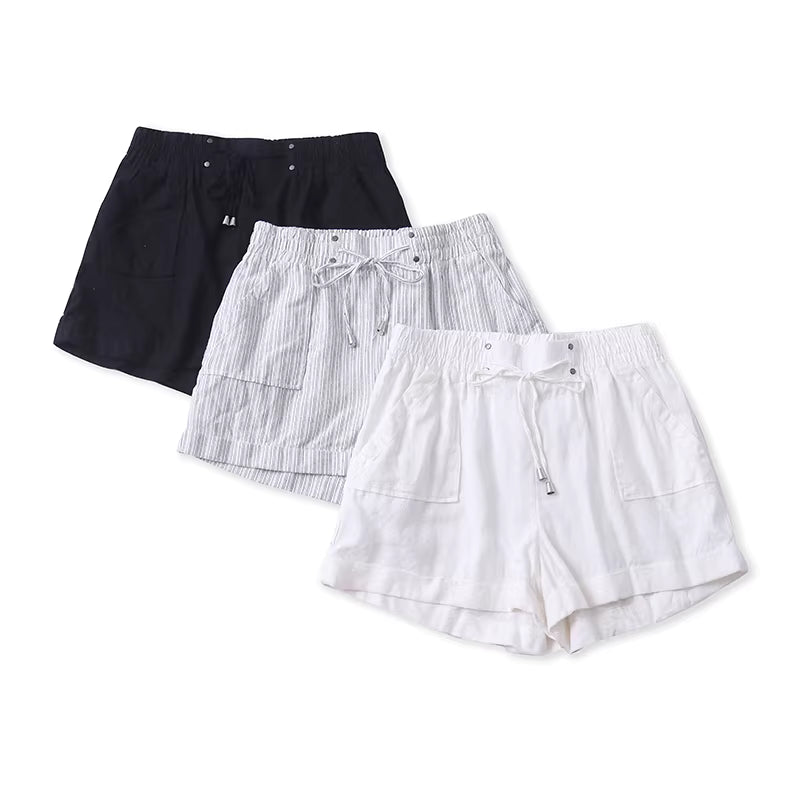 Sommerliche, hautfreundliche und atmungsaktive Shorts aus Baumwolle und Leinen mit hohem Bund und weitem Bein für Damen. Die gerade geschnittene Hose verlängert optisch die Beine und eignet sich ideal für den Alltag. 11375
