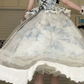 Blue‑White Castle Print Spaghetti Strap Lolita Gown, Ruffled Square Neck, Black Ribbon Bows, Corset‑Style Bodice, Tiered Ruffle Waist Yoke, Tulle Layered Maxi Skirt, Lace Trim Party Dress gh8925