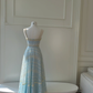 Light Lake Blue Spaghetti Strap Vintage Gown, Square Neck Lace Trim, Glitter Cut‑Out Mixed Lace Fabric, Gold Ribbon Crisscross Tie Waist, A‑Line Midi Full Skirt, Party Prom Dress gh8919