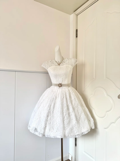 White Lace Short Wedding Cocktail Dress, Cap Sleeve Round Neck With Rhinestone Accent Multi‑Row Pearl Ornate Sash Voluminous A‑Line Homecoming Party Gown gh9250