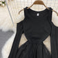 Schwarzes unregelmäßiges langärmliges schulterfreies Kleid Modekleid 10872