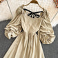 Süßes Kleid mit Schleife und Puffärmeln 10724