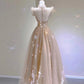 Robe de soirée en tulle et dentelle champagne longueur thé 10313