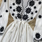 Jolie robe brodée coupe A 639