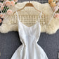 Robe trapèze blanche à col en V et à la mode 574