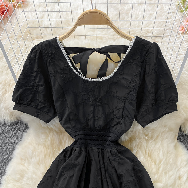 Robe courte à la mode douce en forme de A 545