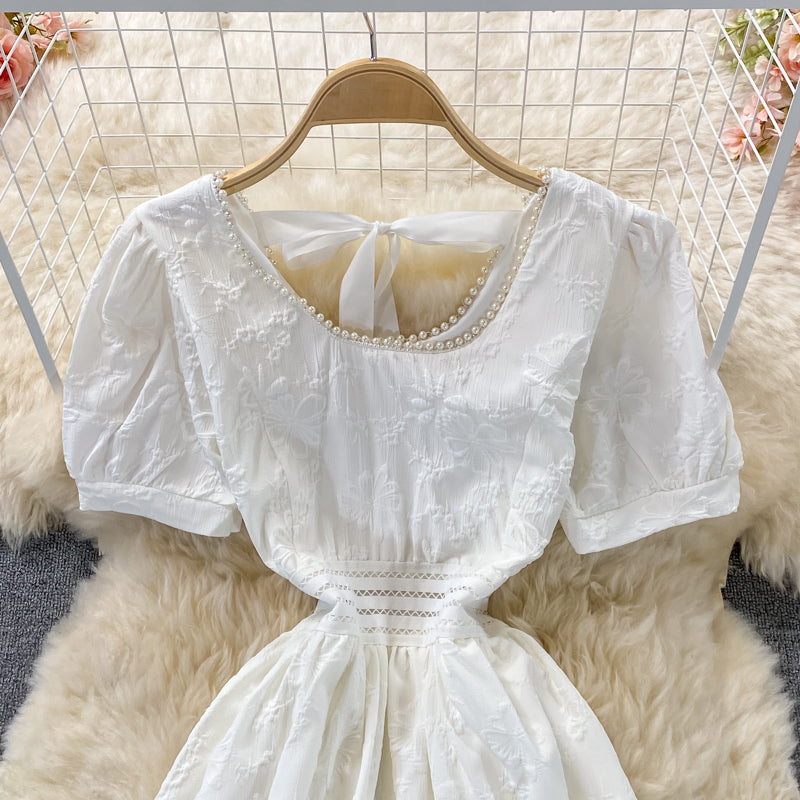 Robe courte à la mode douce en forme de A 545