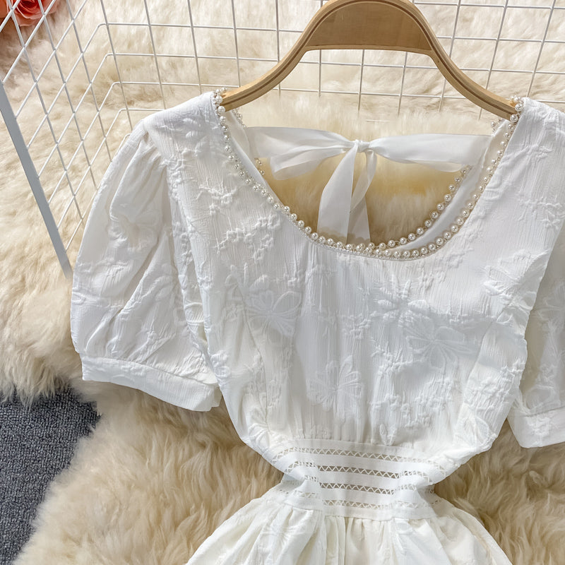 Robe courte à la mode douce en forme de A 545