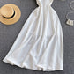 Robe trapèze blanche à col en V et à la mode 574