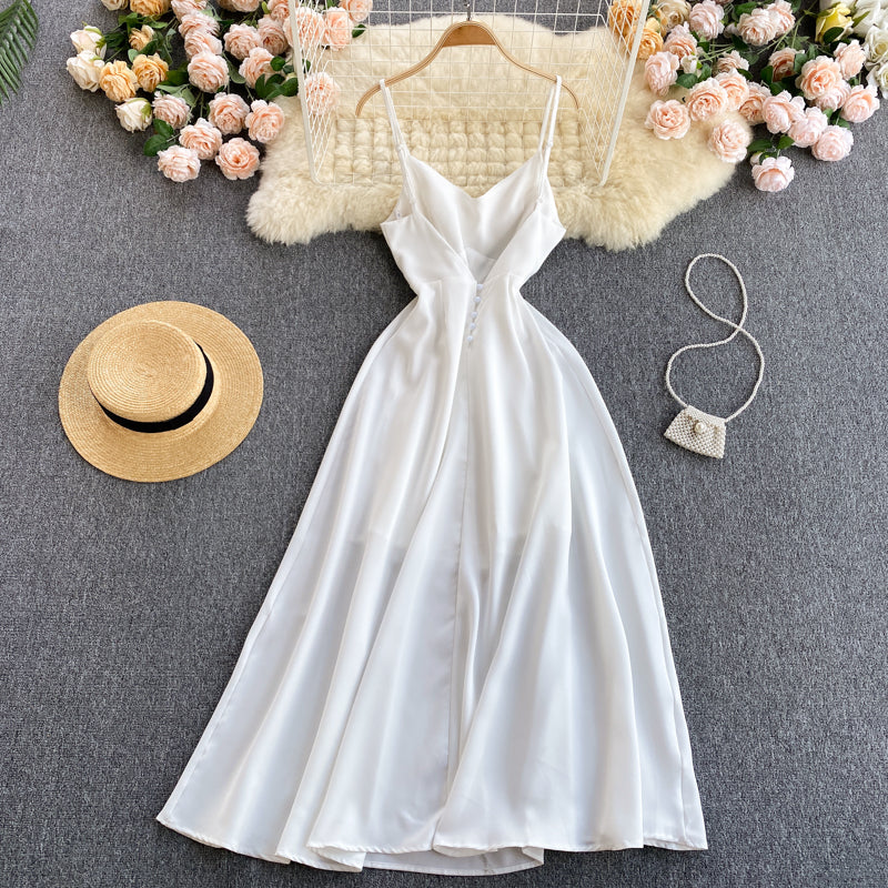 Robe trapèze blanche à col en V et à la mode 574