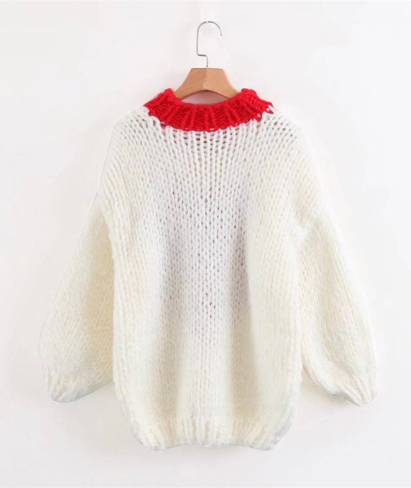 Süßer handgestrickter Pullover mit Herz 111