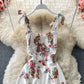 Geblümtes, mittellanges Rüschenkleid mit Fliege 3316