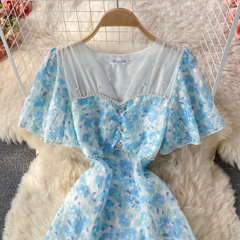 Chiffon-Kleid in A-Linie mit blauem Blumenmuster und Mesh-Nähten und V-Ausschnitt 3219