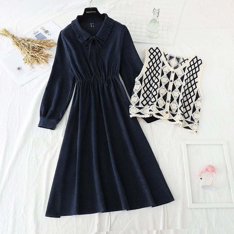 The New Retro waistband is slim, and the two-piece waistcoat skirt is over the knee  2195