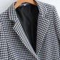 A one-breasted suit jacket with lapel and belt  1378