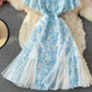 Chiffon-Kleid in A-Linie mit blauem Blumenmuster und Mesh-Nähten und V-Ausschnitt 3219