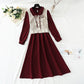 The New Retro waistband is slim, and the two-piece waistcoat skirt is over the knee  2195