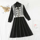 The New Retro waistband is slim, and the two-piece waistcoat skirt is over the knee  2195