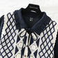 The New Retro waistband is slim, and the two-piece waistcoat skirt is over the knee  2195