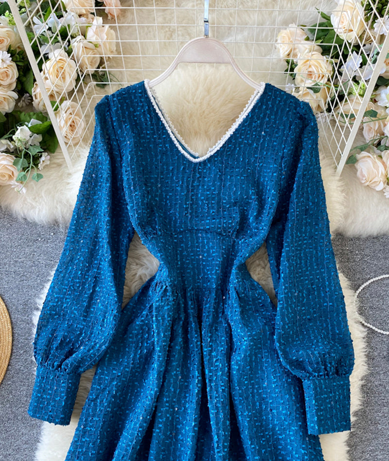 Blaues Langarmkleid mit V-Ausschnitt 978