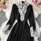 Schwarzes langärmliges Spitzenkleid 967