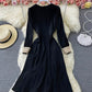 Robe élégante à manches longues et col en V en dentelle noire 854