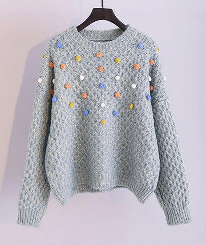 Pull épais à col rond orné de pompons colorés 062