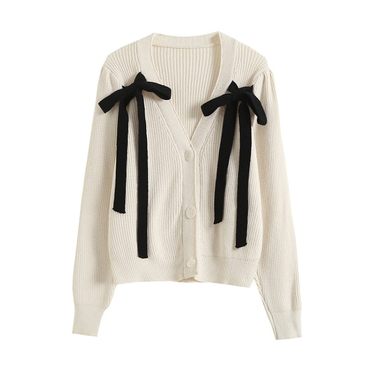 Cardigan vintage en tricot à manches bouffantes et nœud 7412