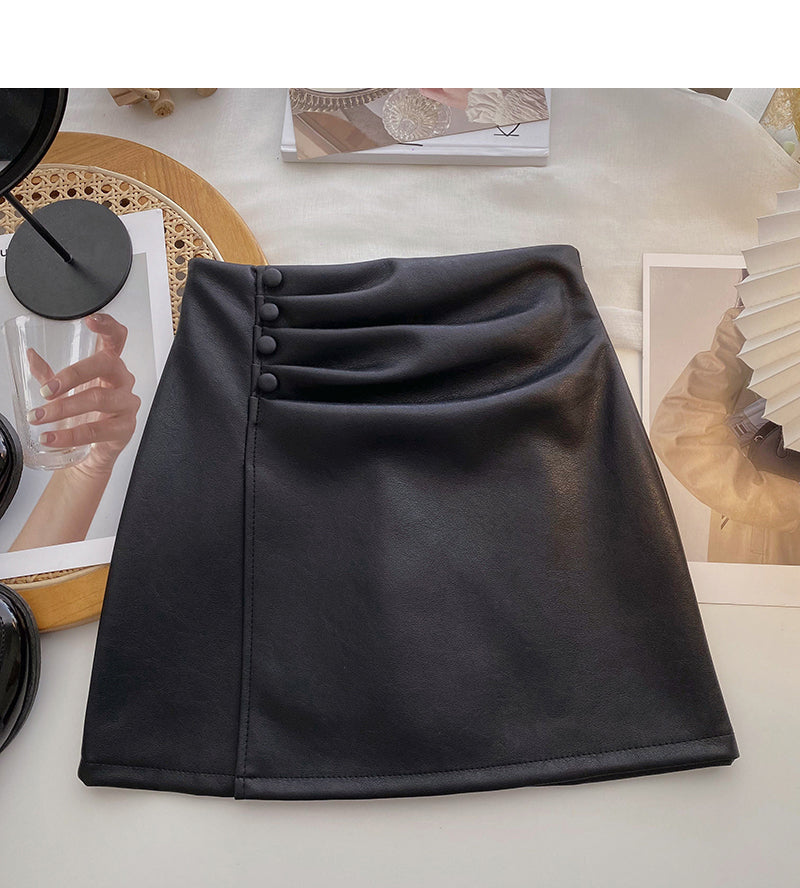 Solid color pleated PU leather short skirt for women is thin and versatile  5587