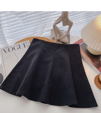 Foreign style leisure solid color high waist A-line umbrella skirt short skirt  5575