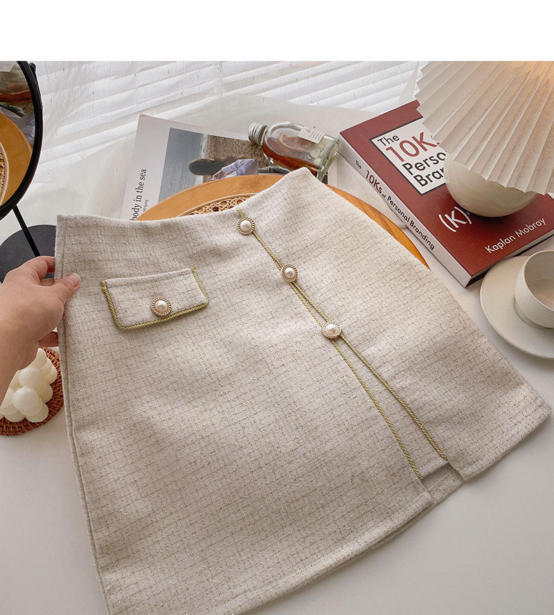 Koreanischer eleganter Retro-Perlenknopf mit hoher Taille A-förmiger Rock 5533