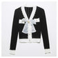 Xiaoxiangfeng V-neck heavy industry rivet bow knit cardigan  7294