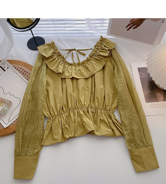 Chemise à lacets, col rond et volants, taille fine 6434