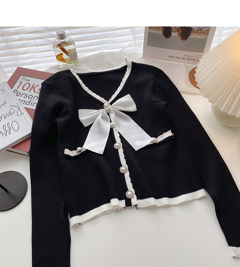 Xiaoxiangfeng V-neck color matching bow knit  6632