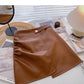 Koreanischer zerknitterter Hip Wrap unregelmäßiger dünner A-förmiger PU-Lederrock mit hoher Taille 5591