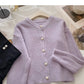 Pull vintage en maille à col rond et boutonnage simple 6174