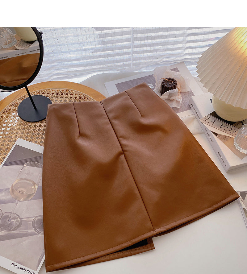 Koreanischer zerknitterter Hip Wrap unregelmäßiger dünner A-förmiger PU-Lederrock mit hoher Taille 5591